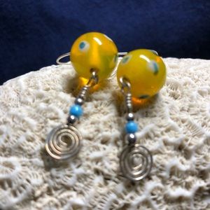 Funky handcrafted sterling silver earrings with decorative glass bead